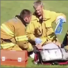  ??  ?? First aid: Rescuers treat the injured actor at the crash scene