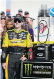  ?? CHUCK BURTON/THE ASSOCIATED PRESS ?? Ryan Blaney celebrates after winning the NASCAR Cup at Charlotte Motor Speedway on Sunday.