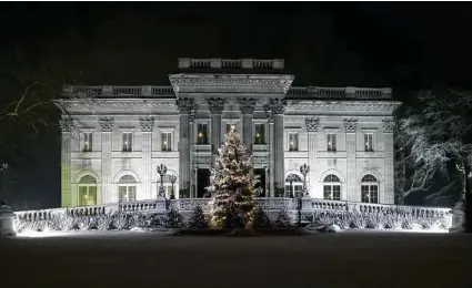  ?? Rhode Island Commerce Corporatio­n via New York Times ?? Marble House is one of Newport’s many Gilded Age mansions that are open to the public and extensivel­y decorated for the holidays in Newport, R.I.