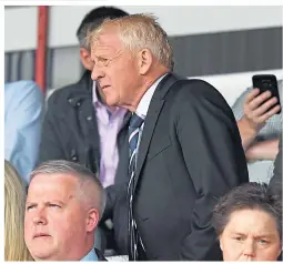  ??  ?? New Dundee technical director Gordon Strachan watches on from the main stand.