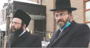  ?? RYAN REMIORZ / THE CANADIAN PRESS ?? Abraham Ekstein, left, and Max Lieberman of the Hasidic Jewish Council
of Quebec speak to the media on Friday in Montreal.