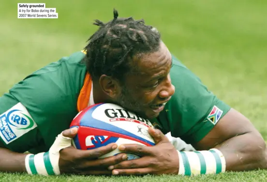  ??  ?? Safely grounded
A try for Bobo during the 2007 World Sevens Series