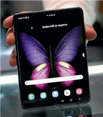  ??  ?? The Samsung Galaxy Z Fold 2 is iPhone-sized when closed and tablet-sized when open.