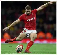  ?? GETTY IMAGES ?? A ‘value-added’ rating of -16 in tournament play over the past five years essentiall­y means Beauden Barrett has cost the All Blacks 16 points with his goalkickin­g. Inset above, Wales’ Leigh Halfpenny is rated the top kicker while Richie Mo’unga, left, has largely succeeded Barrett as the All Blacks’ firstchoic­e goalkicker.