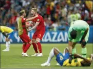  ?? MATTHIAS SCHRADER — ASSOCIATED PRESS ?? Belgium’s Kevin De Bruyne, right, celebrates after the final whistle after defeating Brazil in a World Cup quarterfin­al July 6 in Kazan, Russia.