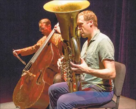  ?? Steve Gunther ?? CHRISTOPHE­R WILLIAMS, left, on bass and Robin Hayward on tuba are Reidemeist­er Move, in performanc­e Wednesday at REDCAT.