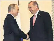  ?? AFP ?? Russian President Vladimir Putin meets Turkish President Tayyip Erdogan in St Petersburg on Tuesday.