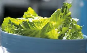  ?? TNS ?? Health officials are urging consumers to throw out store-bought chopped romaine lettuce after an E. coli outbreak.