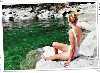  ?? ?? HOT ROCKS: Sunbathers can sit back and simply enjoy the sight of the calm, crystal-clear waters