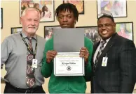  ?? (Pine Bluff Commercial/I.C. Murrell) ?? Watson Chapel High School sophomore Ka’viyon Hudson (center) was honored as a Wildcat Warrior for March. He is pictured with Watson Chapel School District Superinten­dent Tom Wilson and high school Principal Henry Webb.