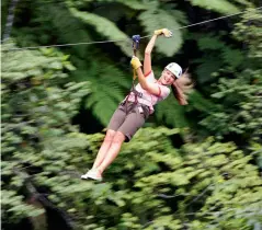  ?? Photograph­y by Tourism Fiji and various establishm­ents. ?? Above: Zip line at high speeds just outside Nadi.