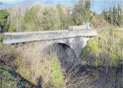  ?? Picture: Angus Findlay. ?? The bridge over the River Almond at Almondbank suffered structural issues.