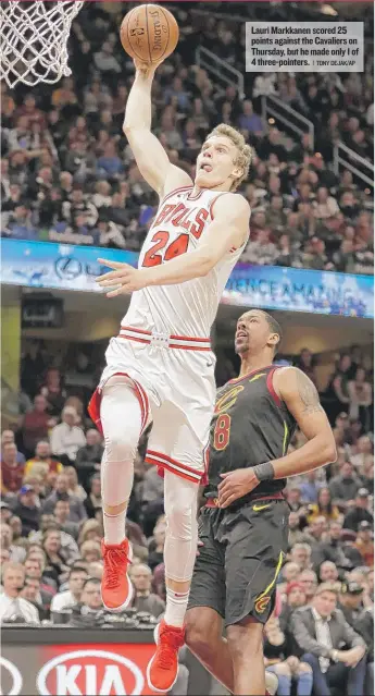  ?? | TONY DEJAK/ AP ?? Lauri Markkanen scored 25 points against the Cavaliers on Thursday, but he made only 1 of 4 three- pointers.