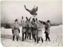  ??  ?? Unknown photograph­er for Chesterfie­ld & Maclaren. Members of snow-shoeing club initiating a new member by means of the “Montreal Bounce,” Montreal, Que., 1924, gelatin silver print.