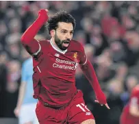  ??  ?? Liverpool’s Mohamed Salah reacts after scoring against Manchester City.