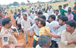  ?? —Deepak Deshpande ?? Agitated villagers protest at the public hearing meet for Pharma City, which was held at Medipally village near Ibrahimpat­nam on Wednesday.