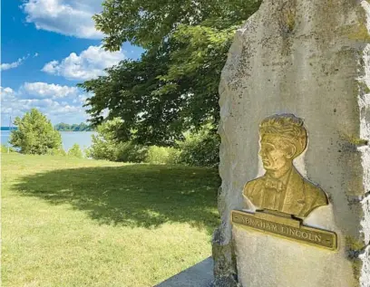  ?? KATHERINE RODEGHIER/CHICAGO TRIBUNE PHOTOS ?? At Lincoln Landing in Rockport, Indiana, a bronze bas-relief of 19-year-old Abraham Lincoln marks the spot on the Ohio River where he departed on a flatboat trip to New Orleans.