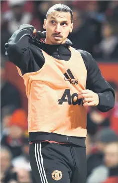  ??  ?? Zlatan Ibrahimovi­c warms up on the touchline during the English Premier League match between Manchester United and Newcastle at Old Trafford in Manchester, north west England in this Nov 18 file photo. — AFP photo