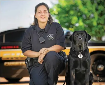  ?? SUBMITTED PHOTO ?? Chester County Sheriff’s Deputy September Spencer enjoys working with her K-9 partner Luke, who is trained in tracking and narcotics detection.