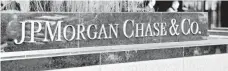  ?? STAN HONDA, AFP/GETTY IMAGES ?? JP Morgan Chase is one of 10 institutio­ns unbound by the deal.