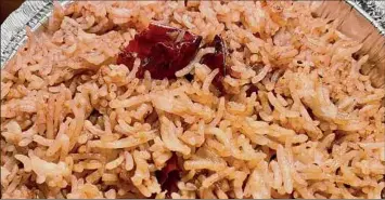  ?? ?? Tamarind rice’s subtle sweetness is balanced by heat from oxblood dried chile peppers.