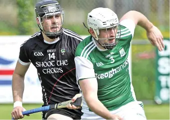  ??  ?? Sligo’s Eoin McDonagh in action with Mark Slevin of Fermanagh.