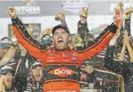  ?? CHUCK BURTON/THE ASSOCIATED PRESS ?? Austin Dillon celebrates winning the Daytona 500 on Sunday in Daytona Beach, Fla.