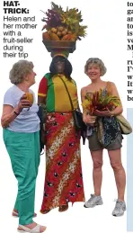  ??  ?? HATTRICK: Helen and her mother with a fruit-seller during their trip