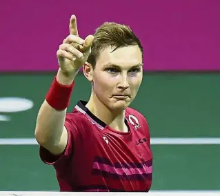  ??  ?? Victorious: Denmark’s Viktor Axelsen celebratin­g his win over China’s Chen Long in the men’s singles semi-finals at the World Championsh­ips in Glasgow on Saturday. — AFP