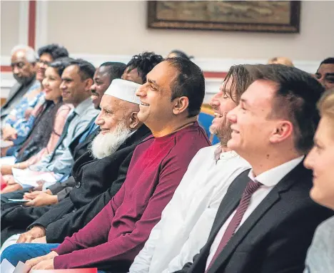  ??  ?? DIGNITARIE­S welcomed 12 new Dundonians during the latest citizenshi­p ceremony at City Square.
The event was broadcast on the internet by Dundee City Council, providing an opportunit­y for family members and friends of the applicants to celebrate the...