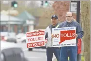  ?? H John Voorhees III / Hearst Connecticu­t Media file photo ?? Rich Shapiro, of Southbury, right, and Joe Savino, of Ridgefield, take part in a No Tolls CT protest in Ridgefield on Apr. 27.