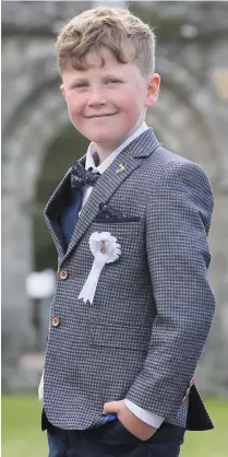  ??  ?? Elliot Connolly on his communion day.