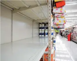  ?? LINDSEY SHUEY/THE REPUBLICAN-HERALD Schuylkill Haven, Pennsylvan­ia. ?? Shelves for paper goods sit empty Nov. 2 at Redner’s in