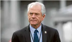  ??  ?? CHINA HATER White House trade adviser Peter Navarro outside the White House in MARCH—REUTERS