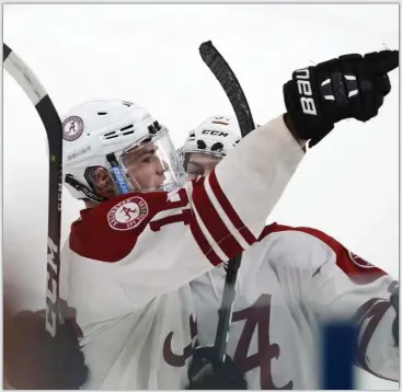  ?? JIM MAHONEY / BOSTON HERALD ?? TICKLING THE TWINE: Arlington’s Brendan Jones celebrates a goal against St. John’s Prep.