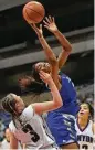  ?? Billy Calzada / San Antonio Express-News ?? Charli Collier of Barbers Hill, center, scored 22 points, but none of her teammates scored more than seven.