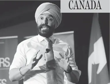  ?? FRED CHARTRAND / THE CANADIAN PRESS ?? Navdeep Bains, Minister of Innovation, Science and Economic Developmen­t announces the Innovation Superclust­ers.