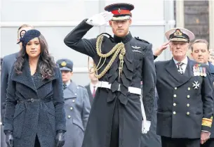  ?? KIRSTY WIGGLESWOR­TH THE ASSOCIATED PRESS FILE PHOTO ?? Prince Harry and Meghan Markle at Remembranc­e Day ceremonies in London in 2019. Royal life may have had hollow qualities, but without it, what’s Harry’s function now? Rosie DiManno asks.