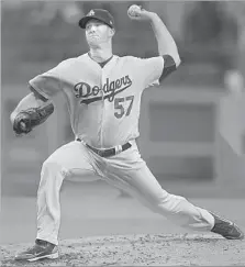  ?? Stephen Dunn Getty Images ?? IN 2015, the Dodgers passed on an opportunit­y to trade for an impact pitcher in order to acquire Alex Wood, who has blossomed.