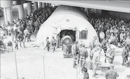  ?? ?? The scene outside the Border Patrol station in El Paso where U.S. officials say they are becoming overwhelme­d in the face of a migration surge. (U.S Customs and Border Patrol / Handout)