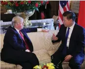  ?? (Lan Hongguang/Xinhua/Sipa USA/TNS) ?? CHINESE PRESIDENT Xi Jinping, right, meets with his US counterpar­t, Donald Trump, in the latter’s Florida resort of Mar-a-Lago in April.