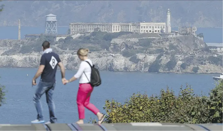  ?? JUSTIN SULLIVAN/GETTY IMAGES ?? Once the gritty home of America’s toughest criminals, the gardens of San Francisco’s Alcatraz Island are becoming known for their unexpected beauty.