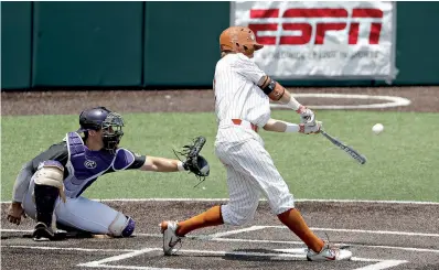  ?? AP Photo/Eric Gay ?? ■ Texas’ Kody Clemens (2) hits a solo home run against Tennessee Tech pitcher Alex Hursey in the third inning of a super regional baseball game Monday in Austin.