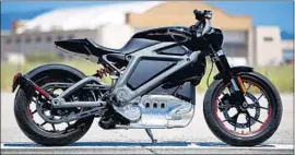  ?? Don Bartletti Los Angeles Times ?? HARLEY unveiled its prototype electric motorcycle, called LiveWire, in 2014. The company has been losing market share as its traditiona­l riders age out.