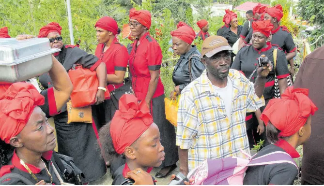  ?? PAUL H WILLIAMS ?? A ‘bands’ arriving at the Zion Jerusalem Spiritual Schoolroom at Watt Town in St Ann.