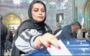  ?? REUTERS ?? A woman casts her vote during parliament­ary elections at a polling n station in Tehran.