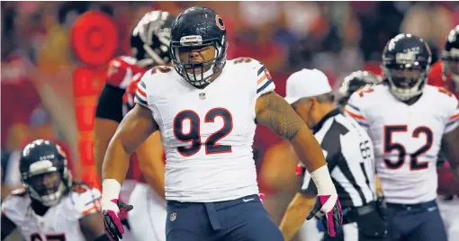  ?? | AP ?? Stephen Paea reacts to a sack of Falcons quarterbac­k Matt Ryan in a victory that moved the Bears to 3- 3— hardly out of contention in this chaotic season.