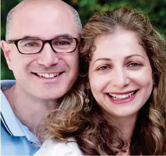  ??  ?? Influentia­l role: Computing expert Martin Moshal, 49, and his wife Ilana