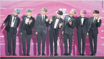  ??  ?? K-pop megastars BTS cancelled four Seoul concerts for April over the coronaviru­s.