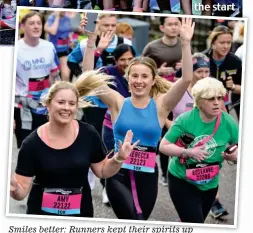  ?? ?? Smiles better: Runners kept their spirits up